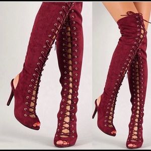 Over the knee lace up boots